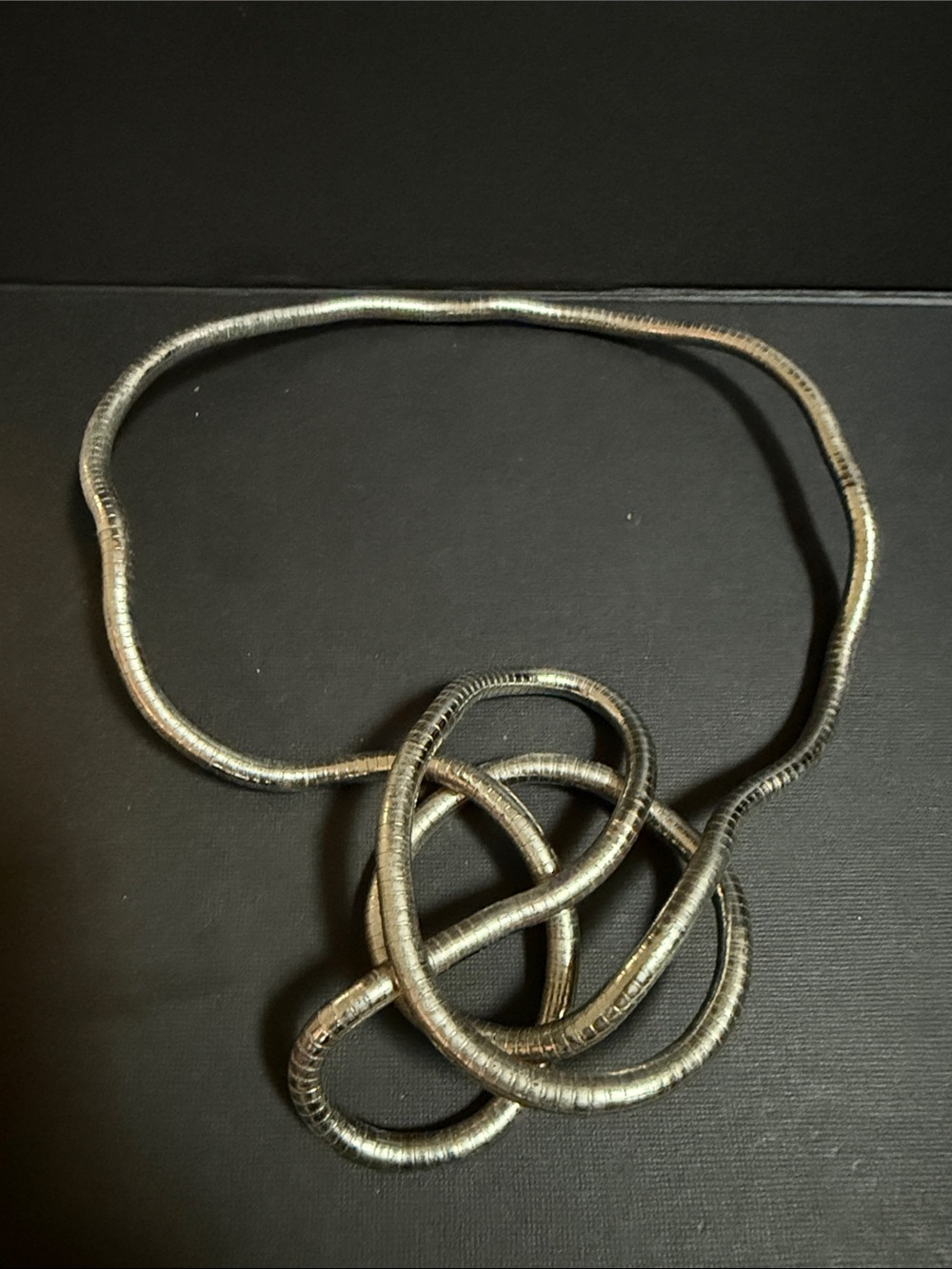 Silver tone flexible necklace 40” in length